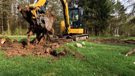 digging out stumps with mini excavator|pulling out stumps with excavator.